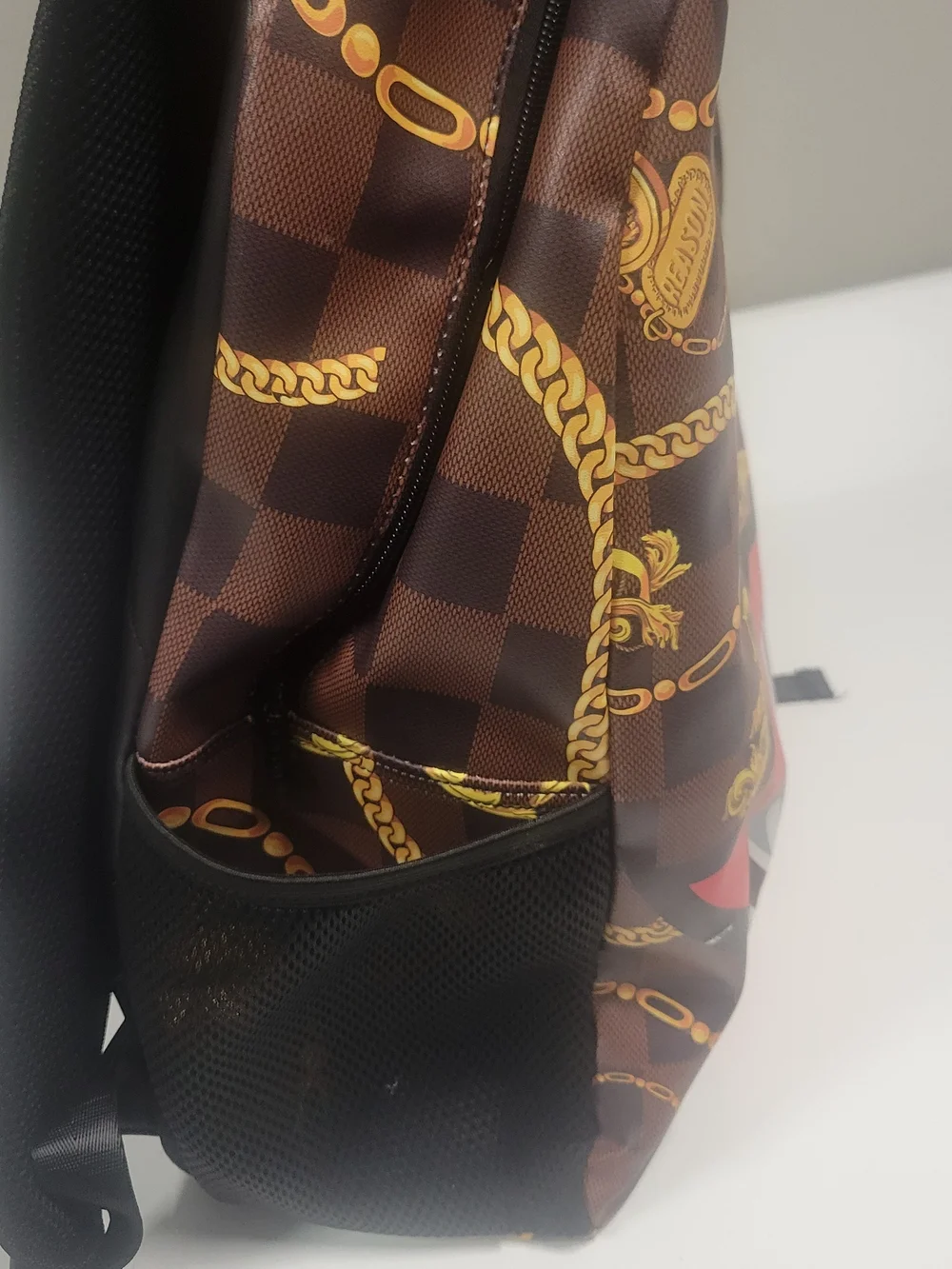 Reason Clothing Shark Mouth Brown Graphic Backpack with Red Accent